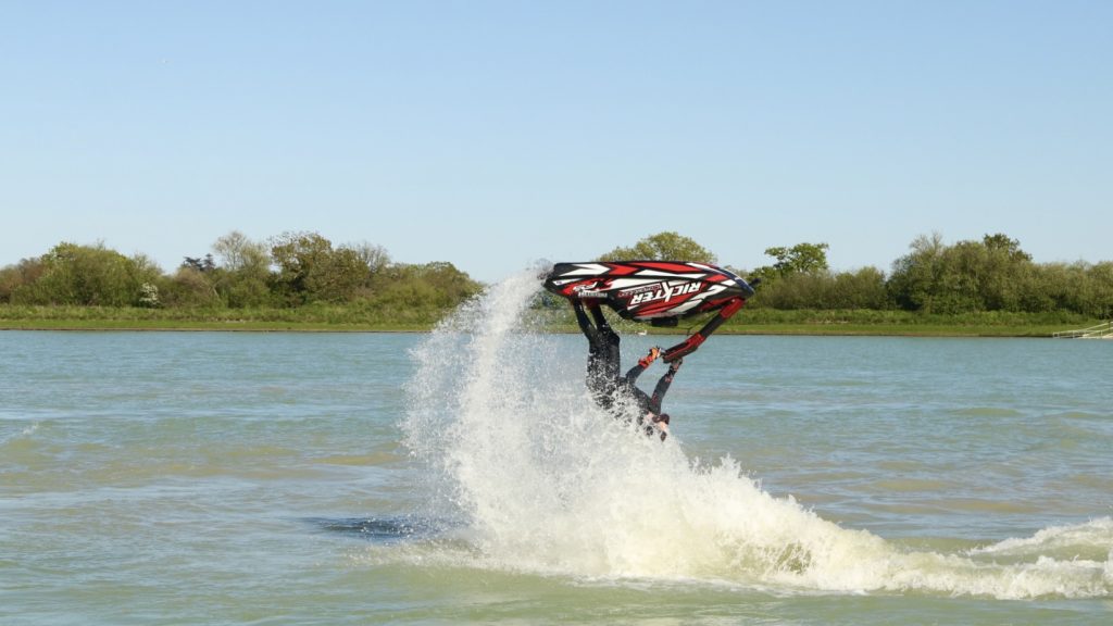 Oggy blasting a backflip on his Stand Up Jet Ski at the West Country Water Park 