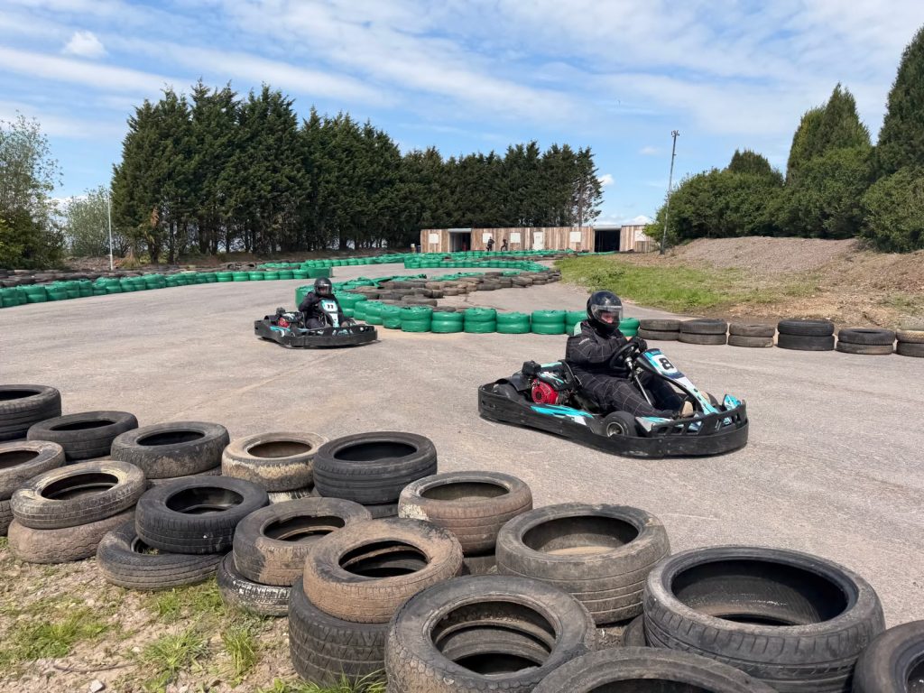 karts coming around the corner.